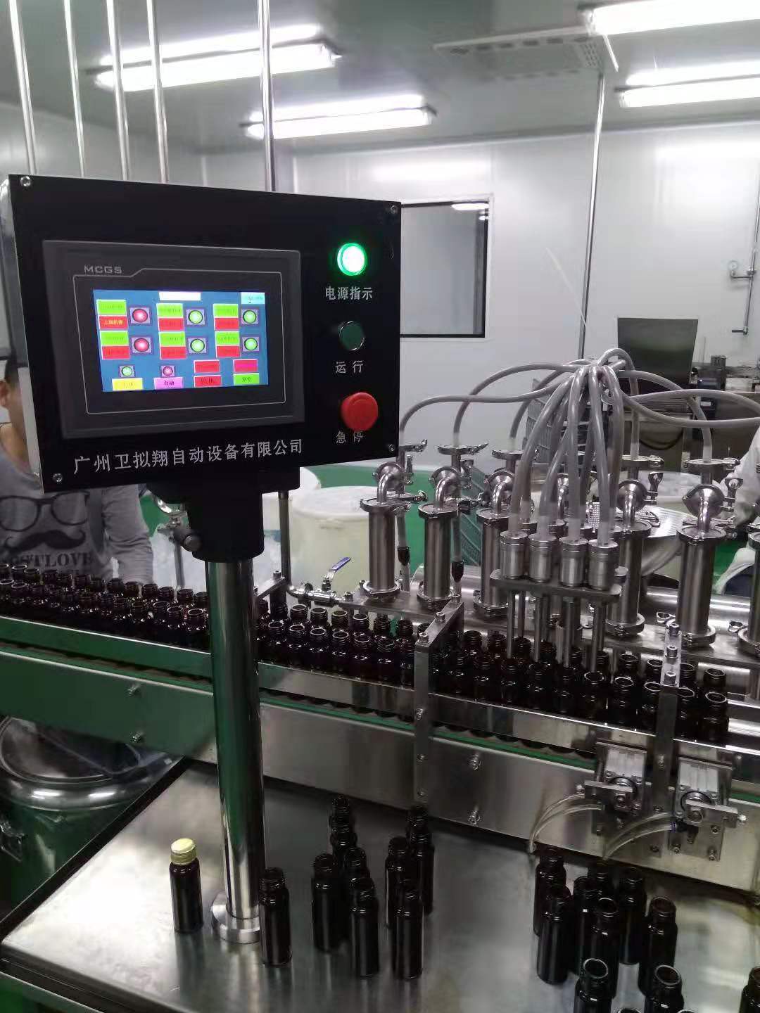 全自動雙軌進瓶灌裝機（高產(chǎn)量的自動化生產(chǎn)線）